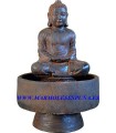 Fuente Buda con pie en piedra artificial.
