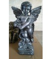 Ángel en piedra artificial color plata.
