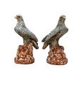 Pareja de águilas en piedra
