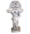 Fuente de niño pez en piedra